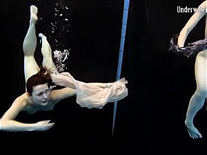 two women swim and get naked super-sexy