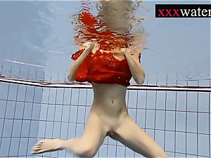 beautiful super-steamy nymph swimming in the pool